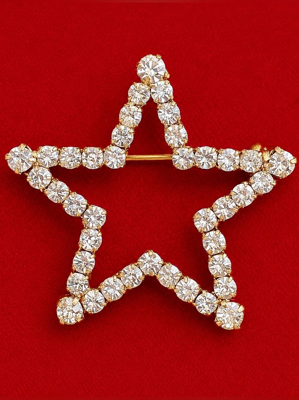 Vintage silver toned rhinestone star brooch pin